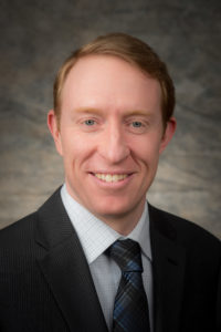 Photograph of Johan Hammerstrom, CEO at CommunityIT. Johan is shown smiling, wearing a dark-colored shirt with a blurred background.